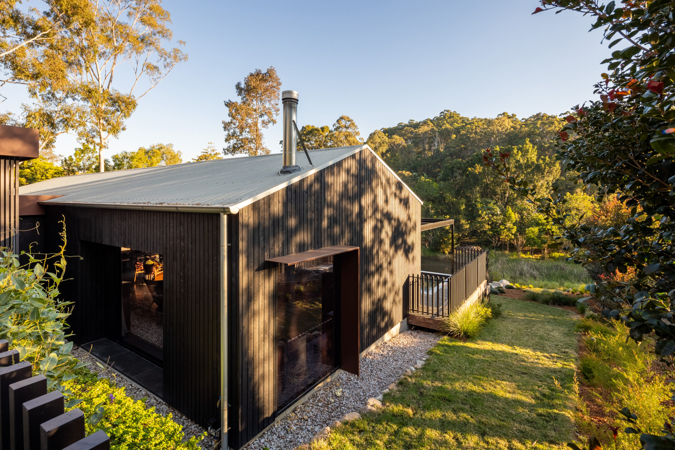 willow meadan luxury farmhouse eumundi noosa hinterland queensland design build custom home facade sustainable scandi barn wood black modern contemporary bushland relax entertain scaled